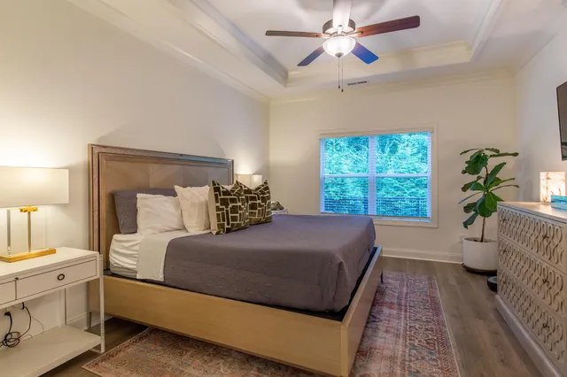 a room with a bed and a window