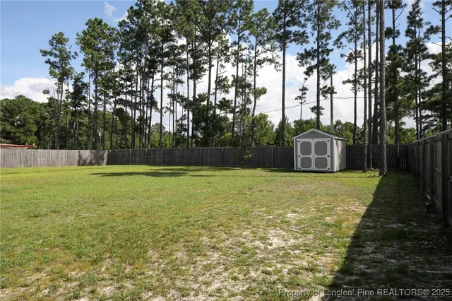 a swimming pool with wooden fence