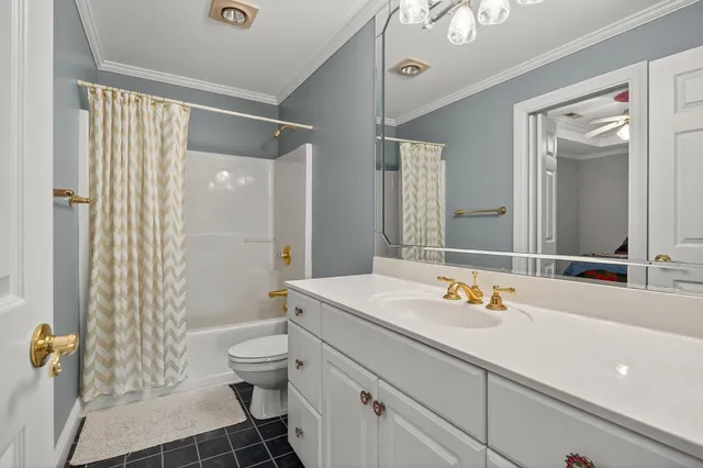 a view of room with furniture and a window