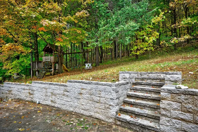 a view of balcony with furniture