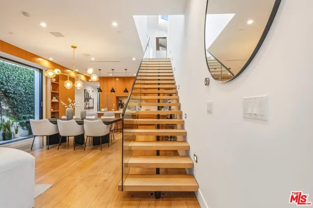 a bathroom with a glass door shower
