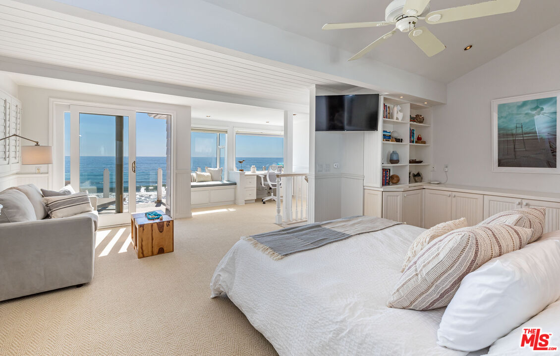 20828 Pacific Coast Highway Malibu, CA 90265 - Photo 9 of 23 a bed room with a bed and a television