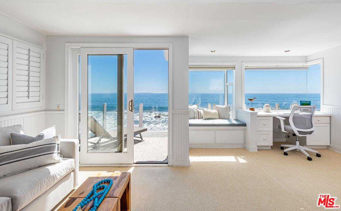 20828 Pacific Coast Highway Malibu, CA 90265 - Photo 10 of 23 a living room with furniture and a table