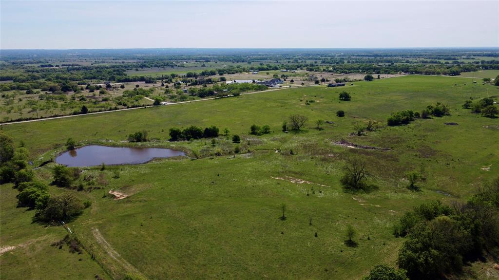 1 County Road 1475 Chico, TX 76431 - Photo 4 of 13 an aerial view of a houses with a yard