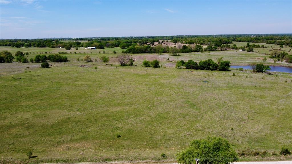 1 County Road 1475 Chico, TX 76431 - Photo 5 of 13 a view of a lake with a yard