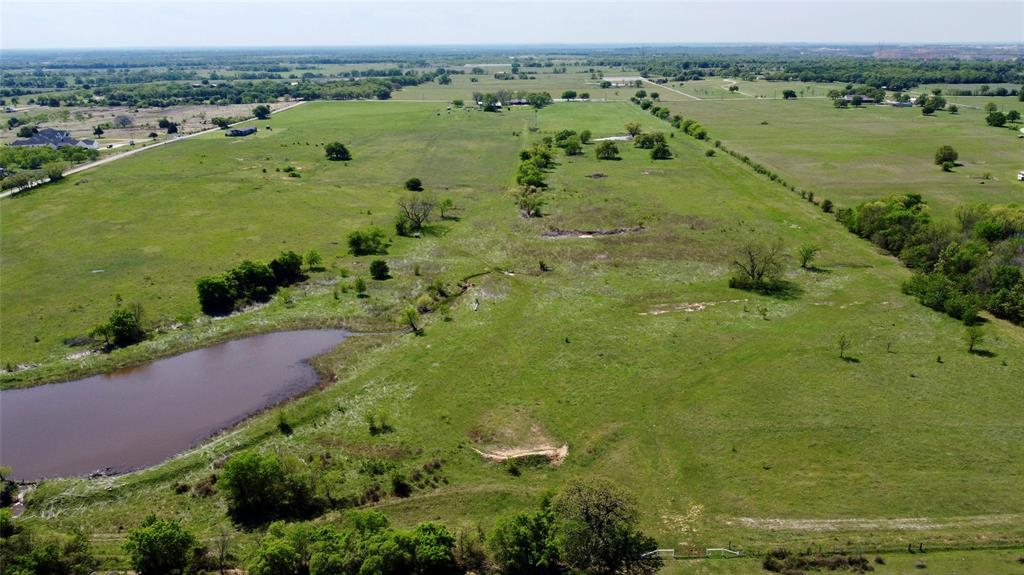 1 County Road 1475 Chico, TX 76431 - Photo 8 of 13 an aerial view of ocean with residential houses with outdoor space and trees