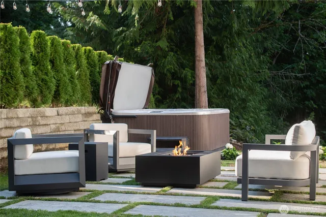 a view of yard from outdoor seating area