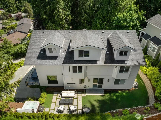 a aerial view of a house with a yard