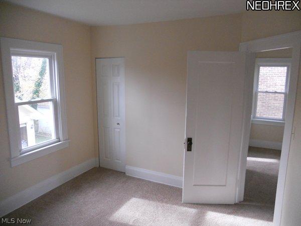 3642 Bainbridge Road Cleveland Heights, OH 44118 - Photo 13 of 25 Really nice bedrooms with all new windows nutral hi-grade carpete light fixtures and refinished woodwork.