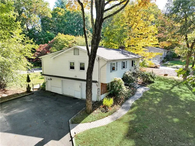 a house view with a garden space