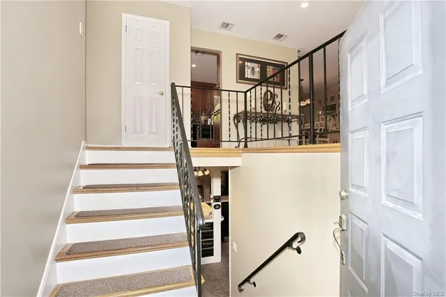 a view of entryway with a front door