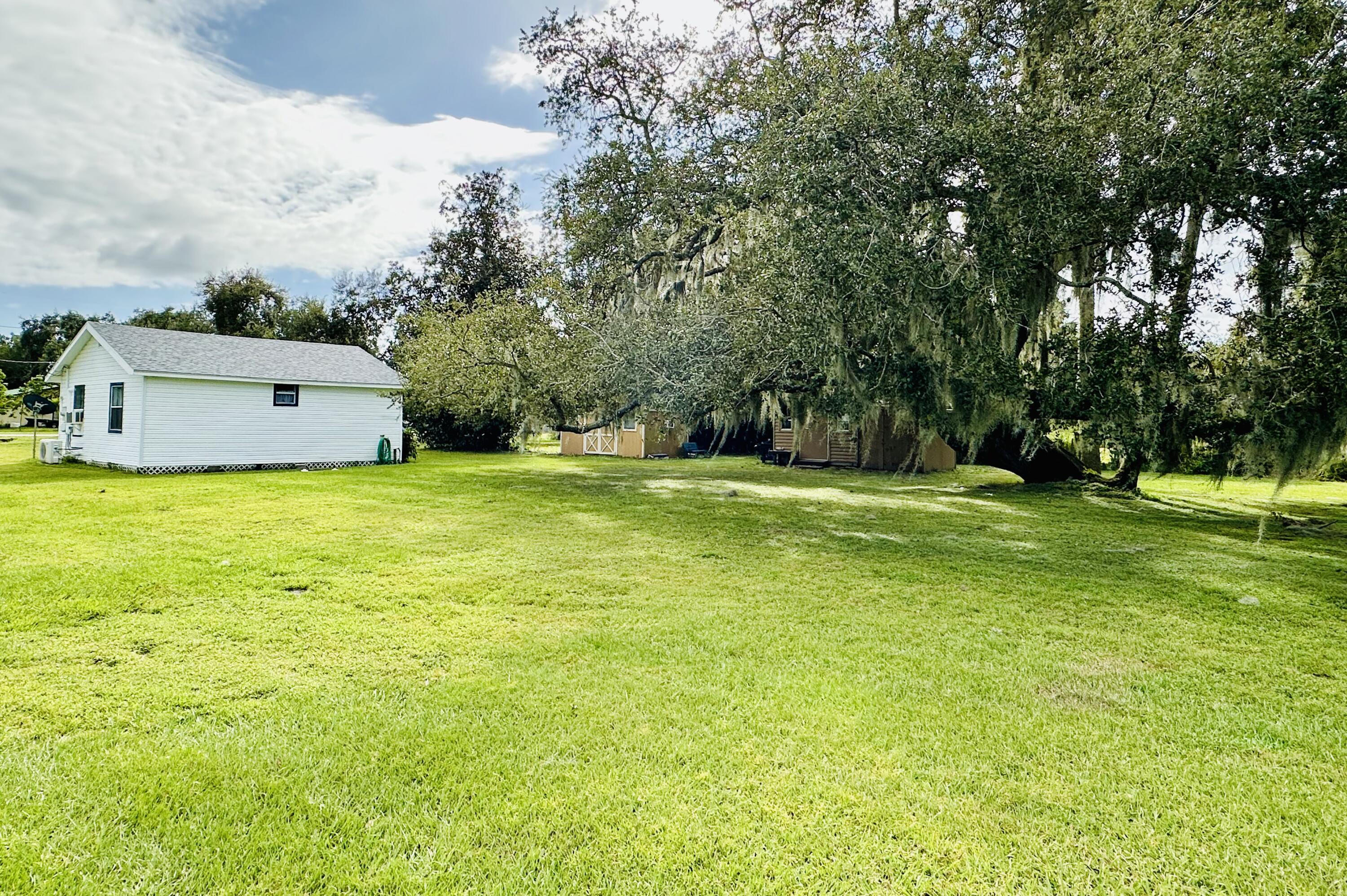 1104 Southwest 11th Street Okeechobee, FL 34974 - Photo 17 of 59 Rear property line facing home