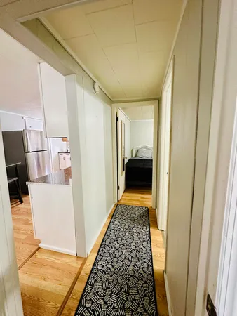 a bathroom with a toilet a sink and a bathtub
