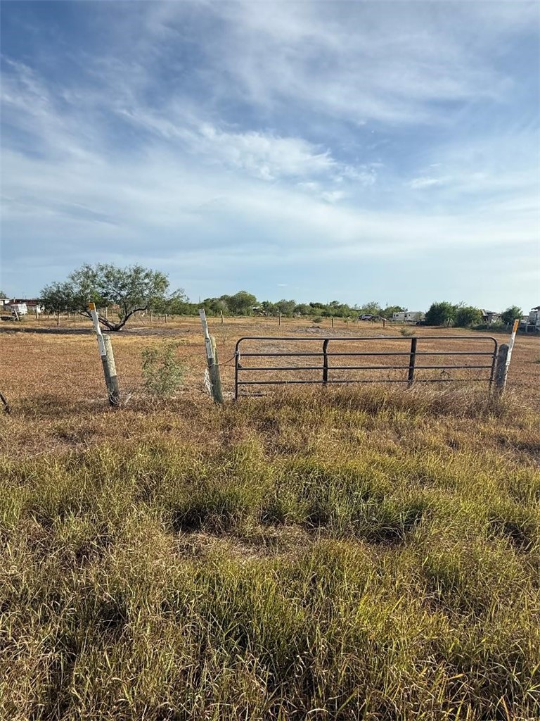 a view of a lake with a yard