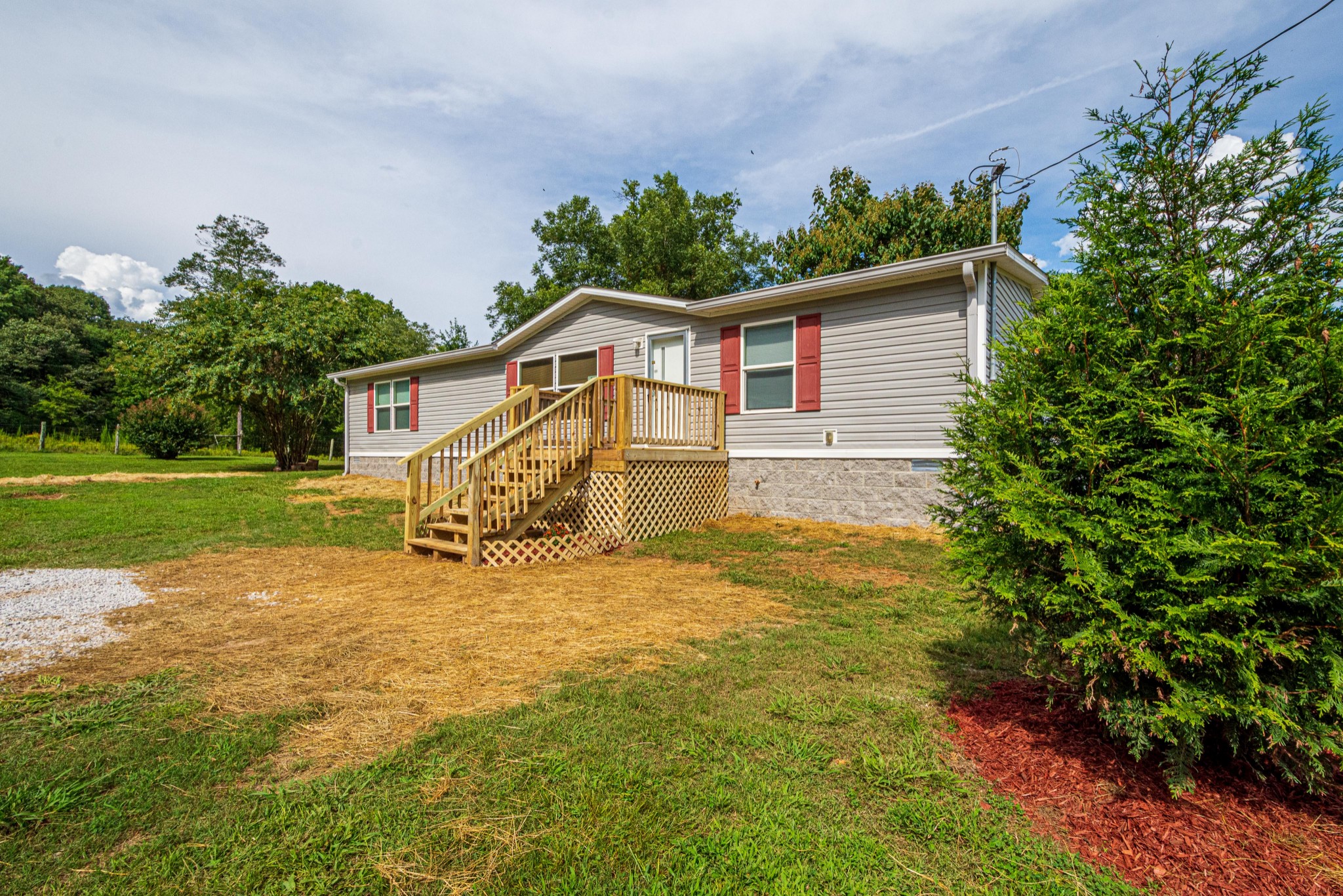 765 Crooked Hill Road Pulaski, TN 38478 - Photo 12 of 50 a view of a house with a yard