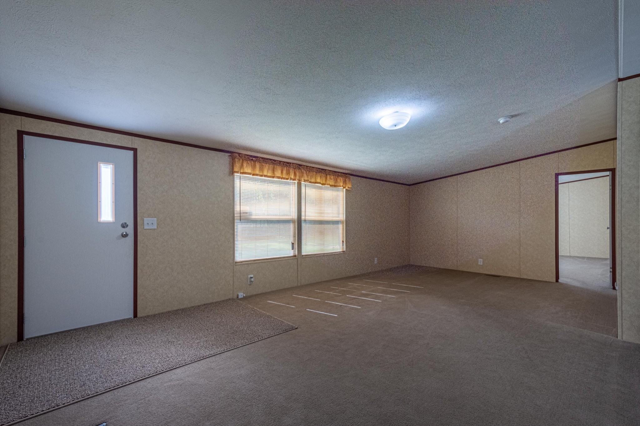 765 Crooked Hill Road Pulaski, TN 38478 - Photo 18 of 50 an empty room with a empty space and windows