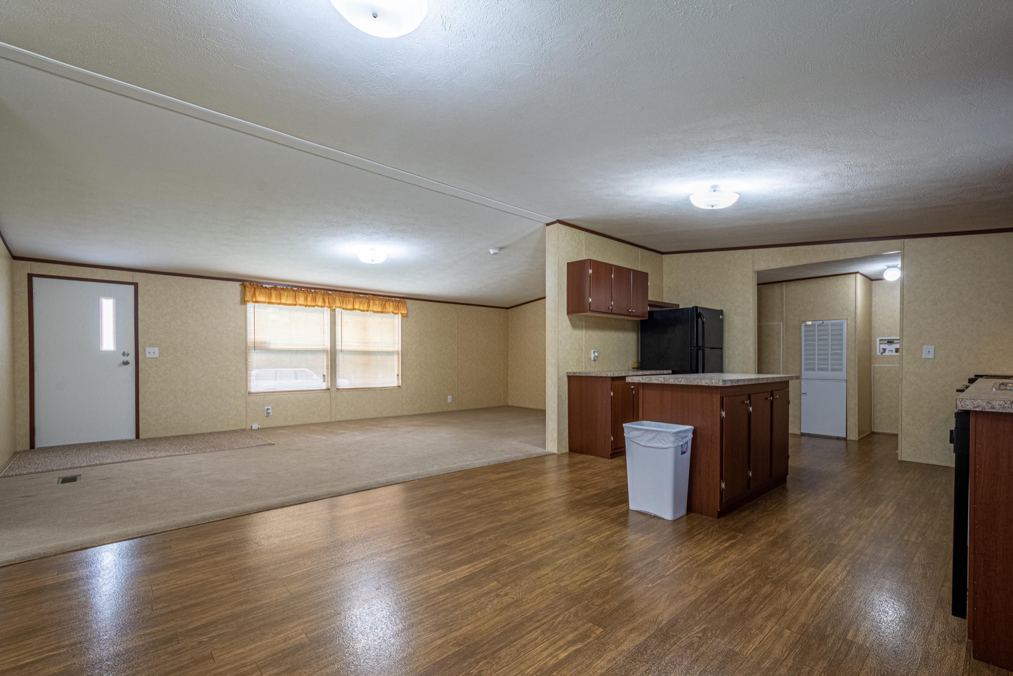 765 Crooked Hill Road Pulaski, TN 38478 - Photo 20 of 50 an empty room with wooden floor and windows
