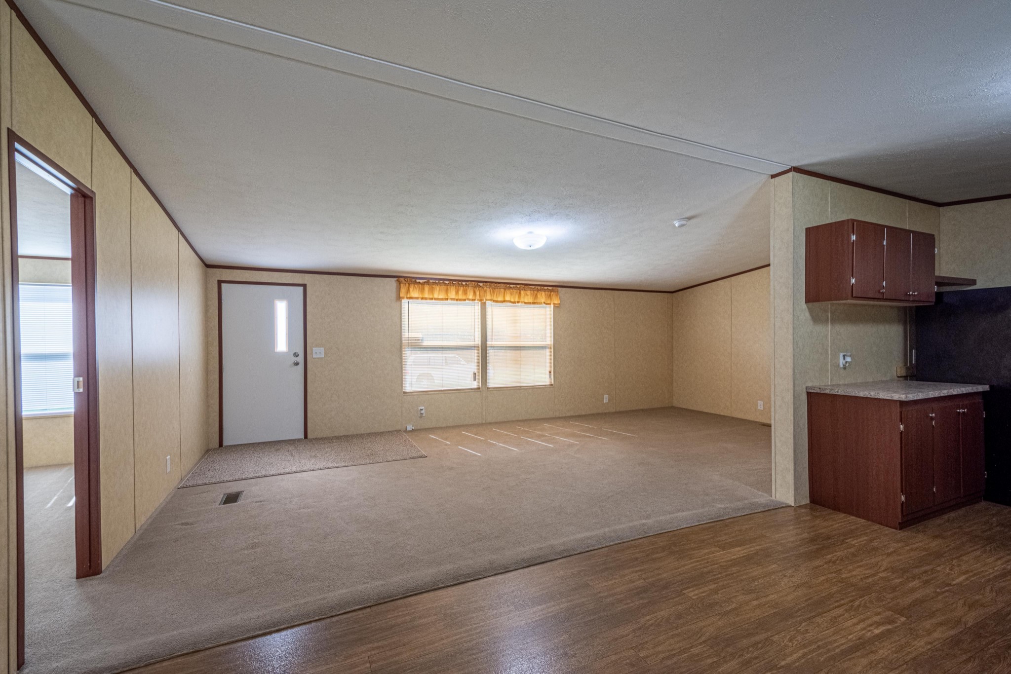 765 Crooked Hill Road Pulaski, TN 38478 - Photo 30 of 50 a view of an empty room with a kitchen
