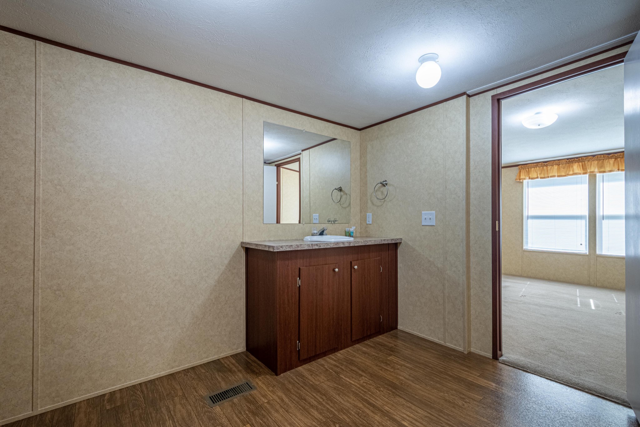 765 Crooked Hill Road Pulaski, TN 38478 - Photo 38 of 50 a bathroom with a sink and a mirror