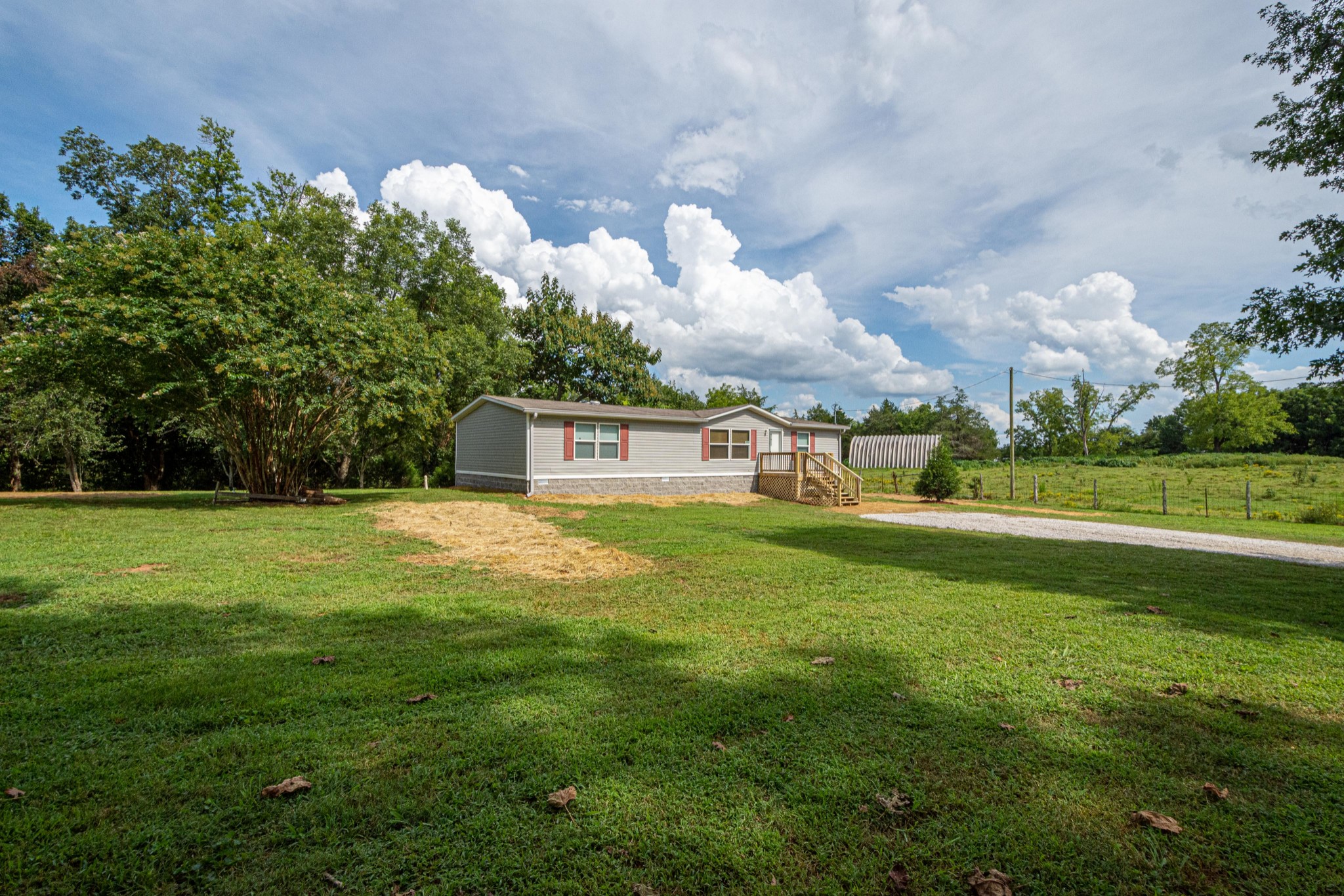 765 Crooked Hill Road Pulaski, TN 38478 - Photo 5 of 50 a front view of a house with a yard