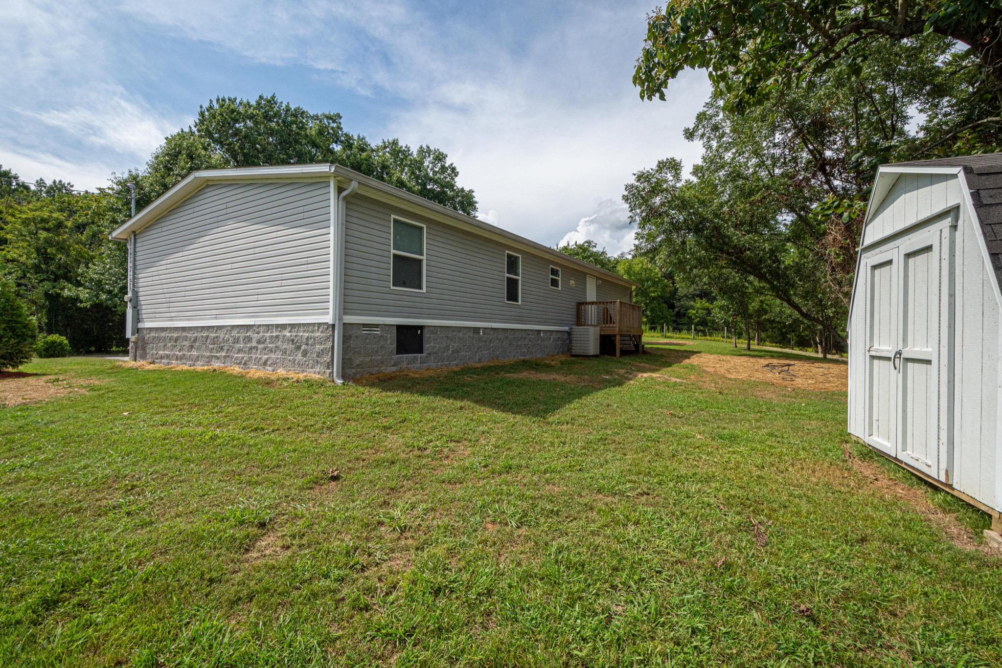 765 Crooked Hill Road Pulaski, TN 38478 - Photo 8 of 50 a view of a house with backyard and garden