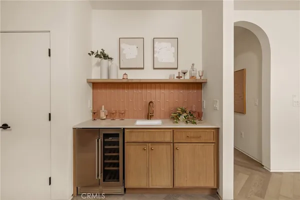 a view of cabinets and wooden floor