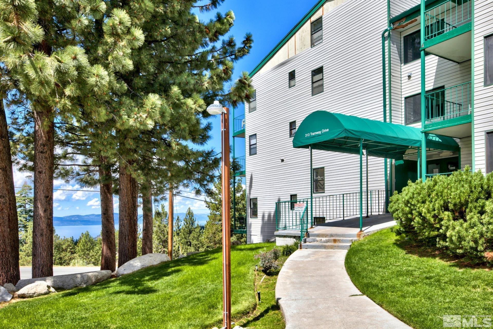 313 Tramway Drive, Unit 4 Stateline, NV 89449 - Photo 3 of 26 a view of a house with a yard