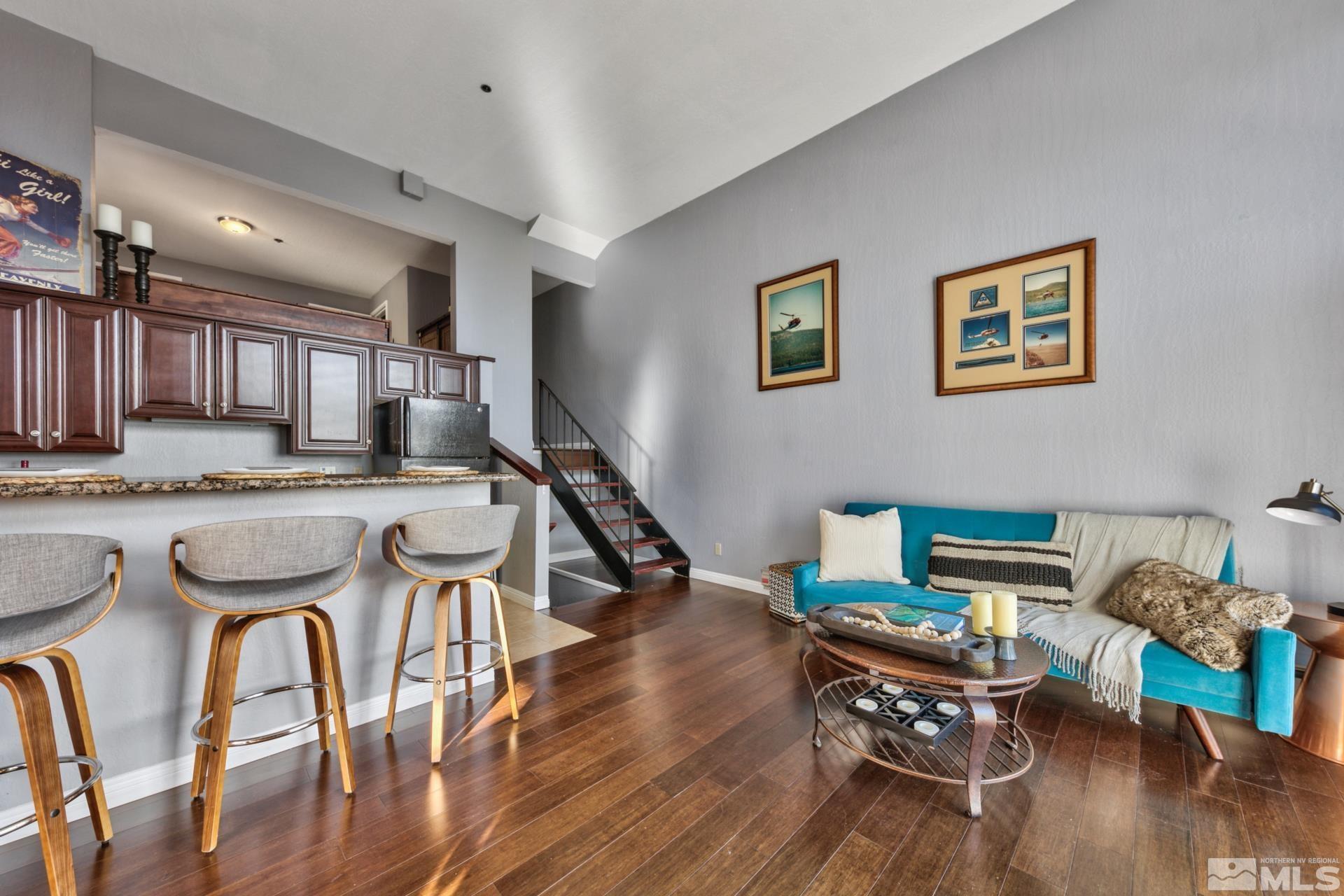 313 Tramway Drive, Unit 4 Stateline, NV 89449 - Photo 7 of 26 a dining room with furniture and wooden floor