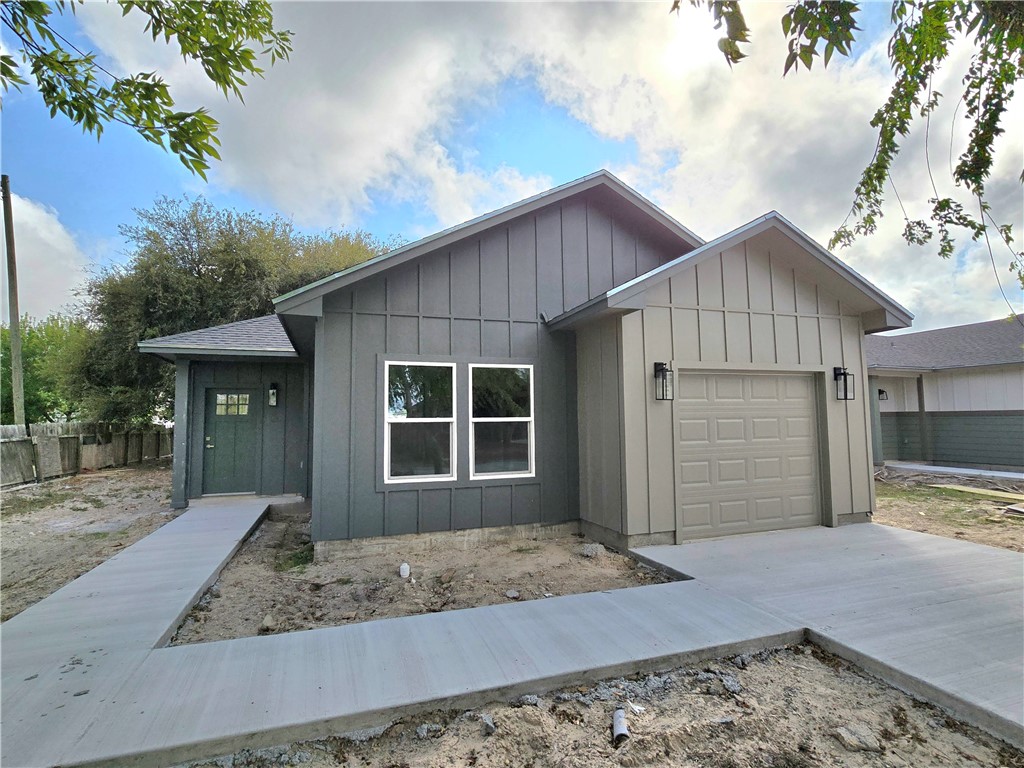 829 Utica Street Corpus Christi, TX 78418 - Photo 1 of 12 a front view of a house with garden