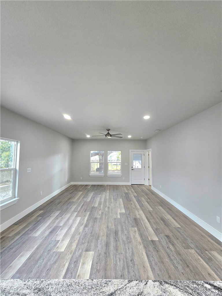 829 Utica Street Corpus Christi, TX 78418 - Photo 2 of 12 a view of an empty room and window