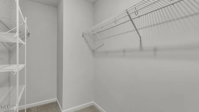 a view of small space with racks on the wall