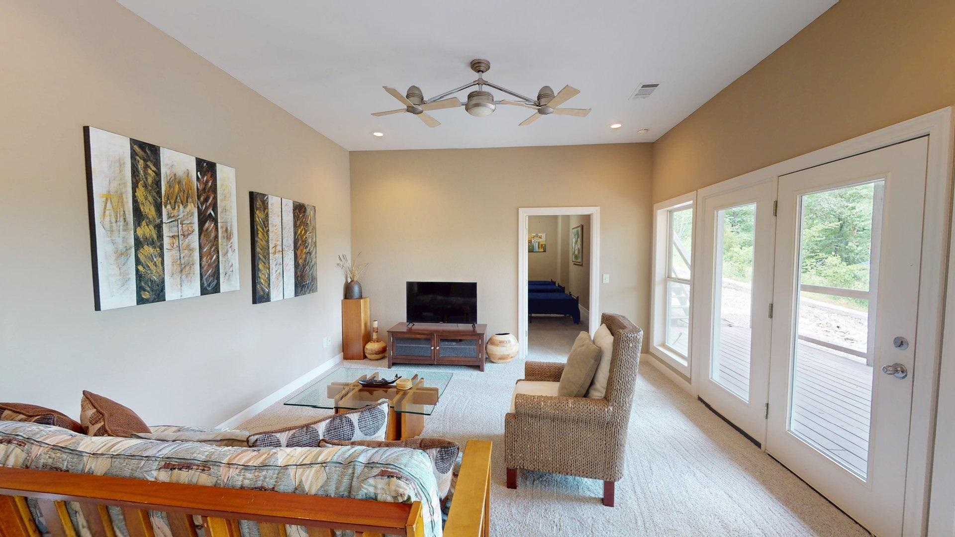 1085 Caney Hollow Road Counce, TN 38326 - Photo 16 of 39 Living room with light colored carpet, a ceiling fan, baseboards, and recessed lighting