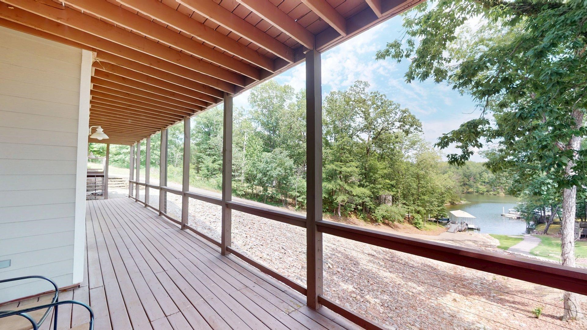 1085 Caney Hollow Road Counce, TN 38326 - Photo 25 of 39 a view of a room with wooden floor and iron stairs