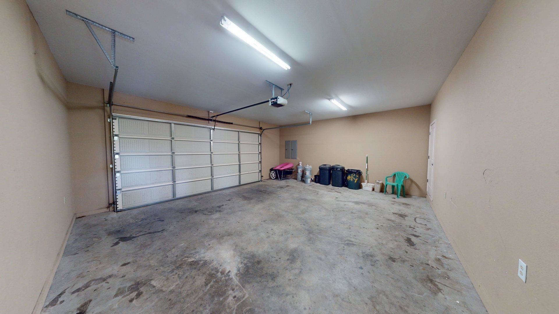 1085 Caney Hollow Road Counce, TN 38326 - Photo 33 of 39 Garage with a garage door opener and electric panel