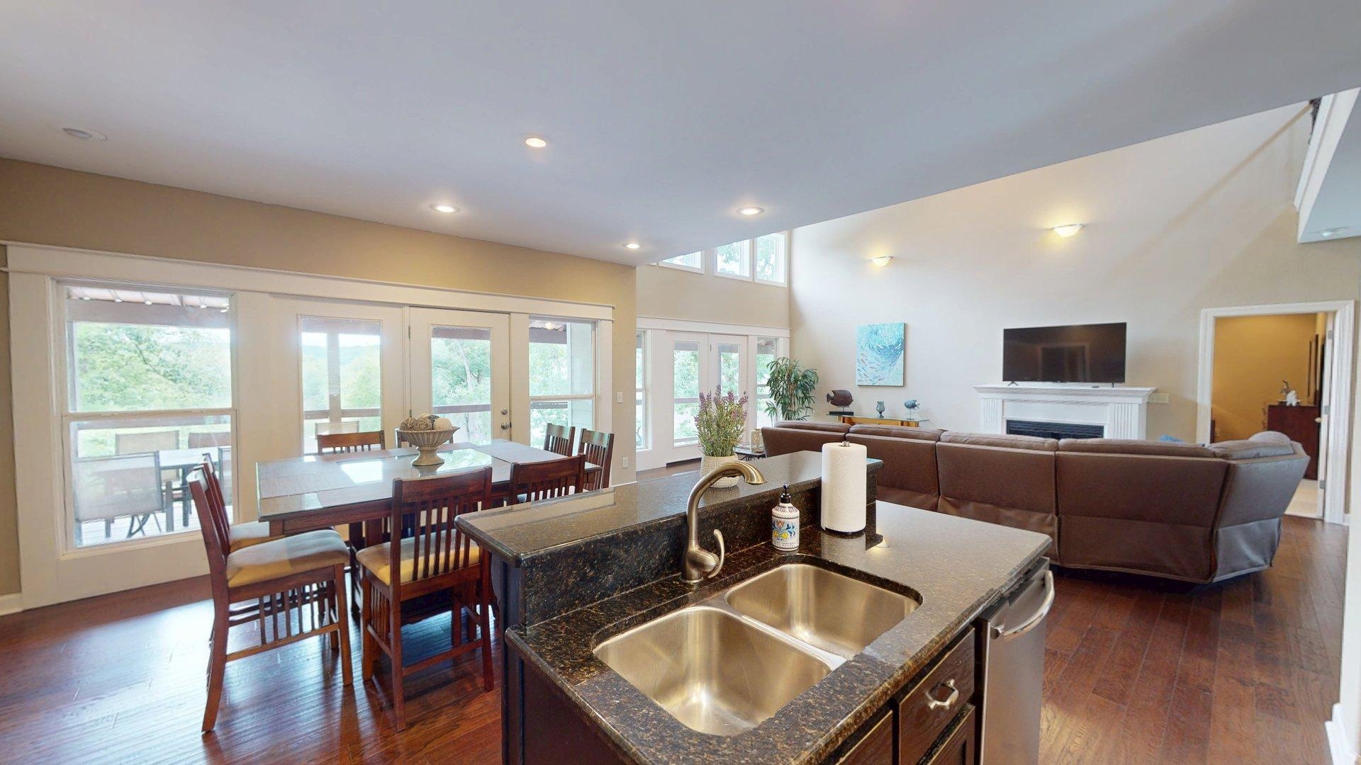 1085 Caney Hollow Road Counce, TN 38326 - Photo 8 of 39 a living room with furniture flat screen tv and a large window