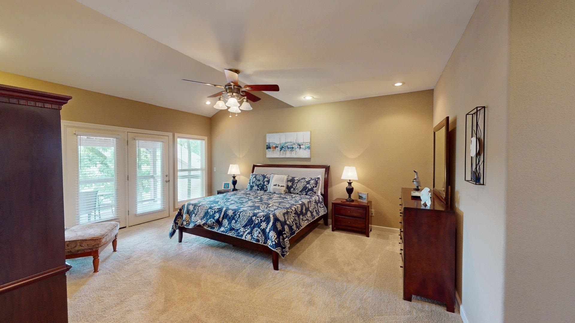 1085 Caney Hollow Road Counce, TN 38326 - Photo 10 of 39 Bedroom with access to outside, light colored carpet, lofted ceiling, a ceiling fan, and recessed lighting