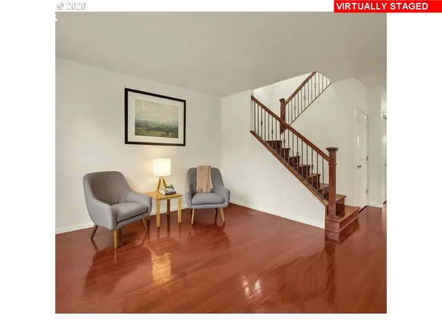 a view of a workspace with furniture and a workspace