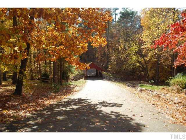 12325 Whartons Way Raleigh, NC 27613 - Photo 24 of 25 Yes, that is a covered bridge and we are not in Madison County. Imagine living in this friendly neighborhood with this feature as a greeting. Straight from a postcard. Other