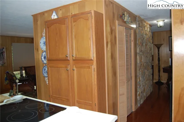 a kitchen with a sink and a refrigerator