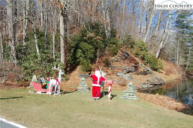 a view of outdoor space with deck and tree