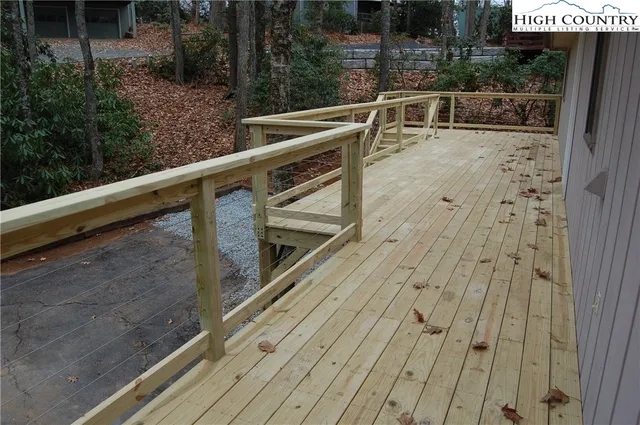 a view of backyard with seating space