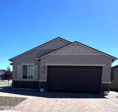 a black and white building with black outdoor space