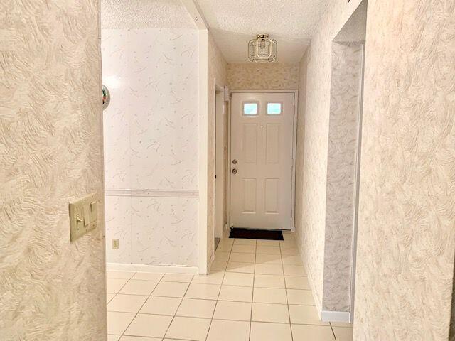 9095 Flynn Circle, Unit 6 Boca Raton, FL 33496 - Photo 5 of 19 a view of an empty room