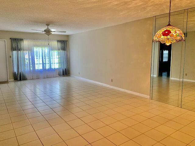 9095 Flynn Circle, Unit 6 Boca Raton, FL 33496 - Photo 6 of 19 a view of a room with window