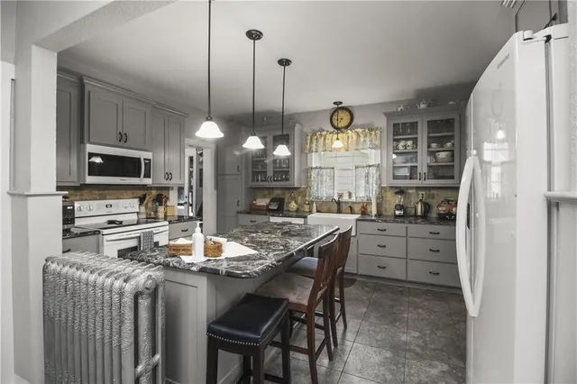 $875,000 | 508 Southeast 12th Street, Oak Grove, MO 64075