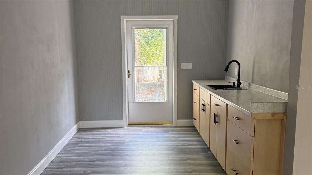 7226 Alafia Ridge Loop Riverview, FL 33569 - Photo 30 of 51 a view of a kitchen from a hallway