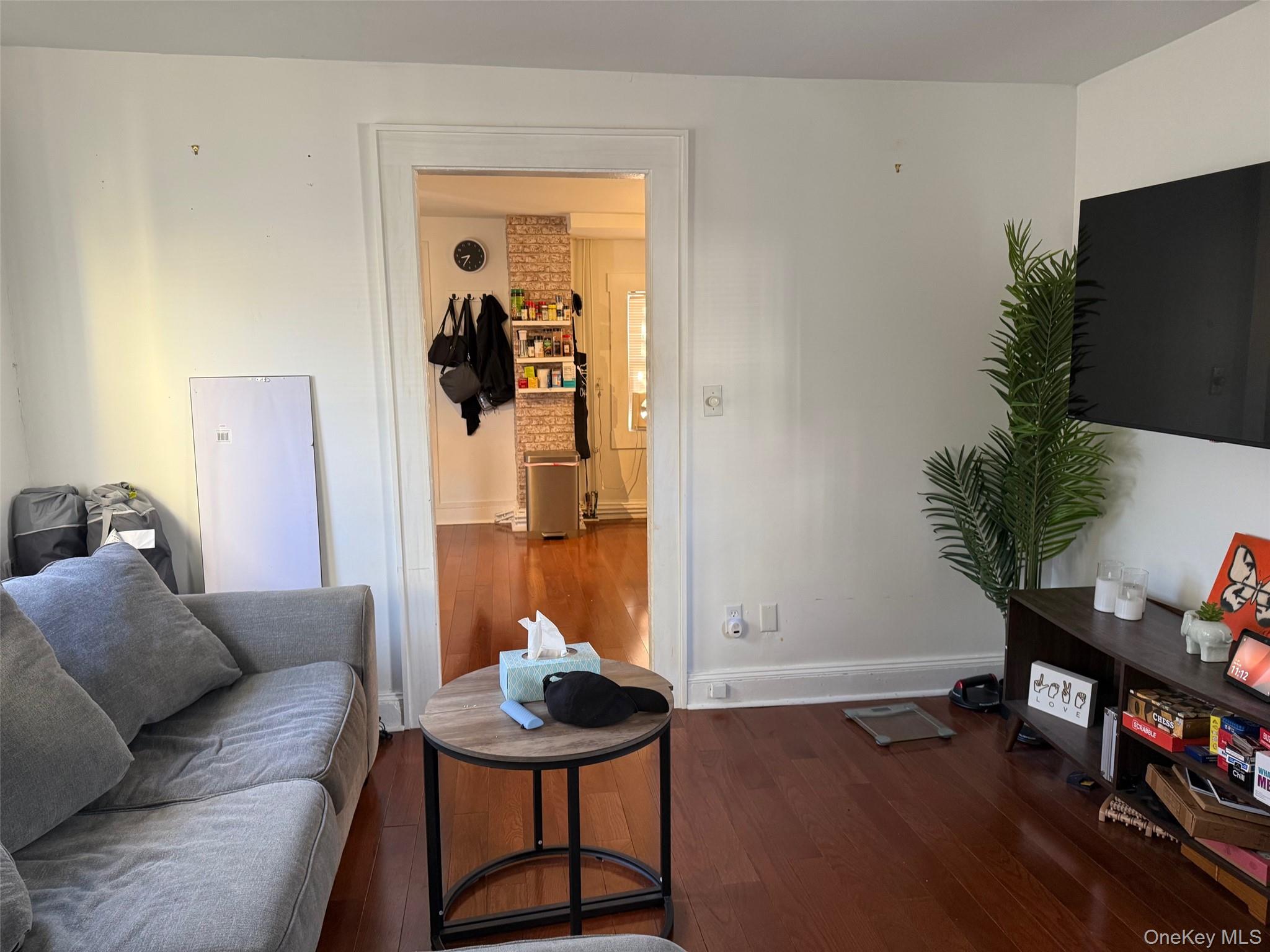 93 Jackson Avenue, Unit 1 Nyack, NY 10960 - Photo 5 of 10 Living area featuring dark wood-style floors