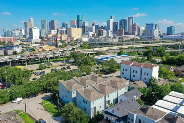a view of a city with tall buildings