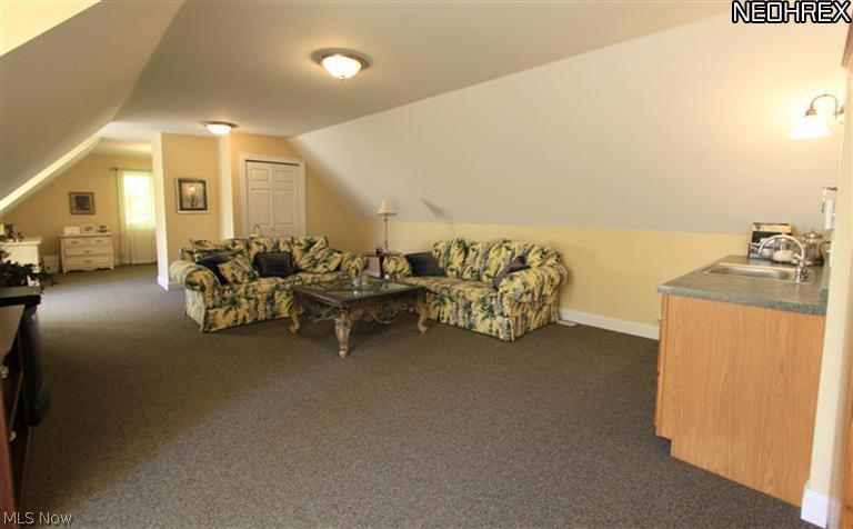 7900 Bainbridge Road Bainbridge, OH 44023 - Photo 20 of 25 Teen/In-Law Suite -- has full bath, closets, living room with mini-kitchen, and private bedroom, Can be accessed also from back stairwell entrance from the first floor.
