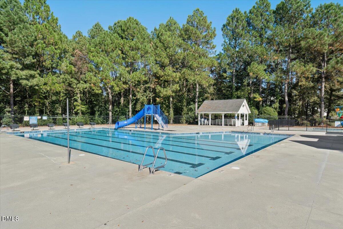 324 Waterville Street Raleigh, NC 27603 - Photo 13 of 82 a view of a house with large trees